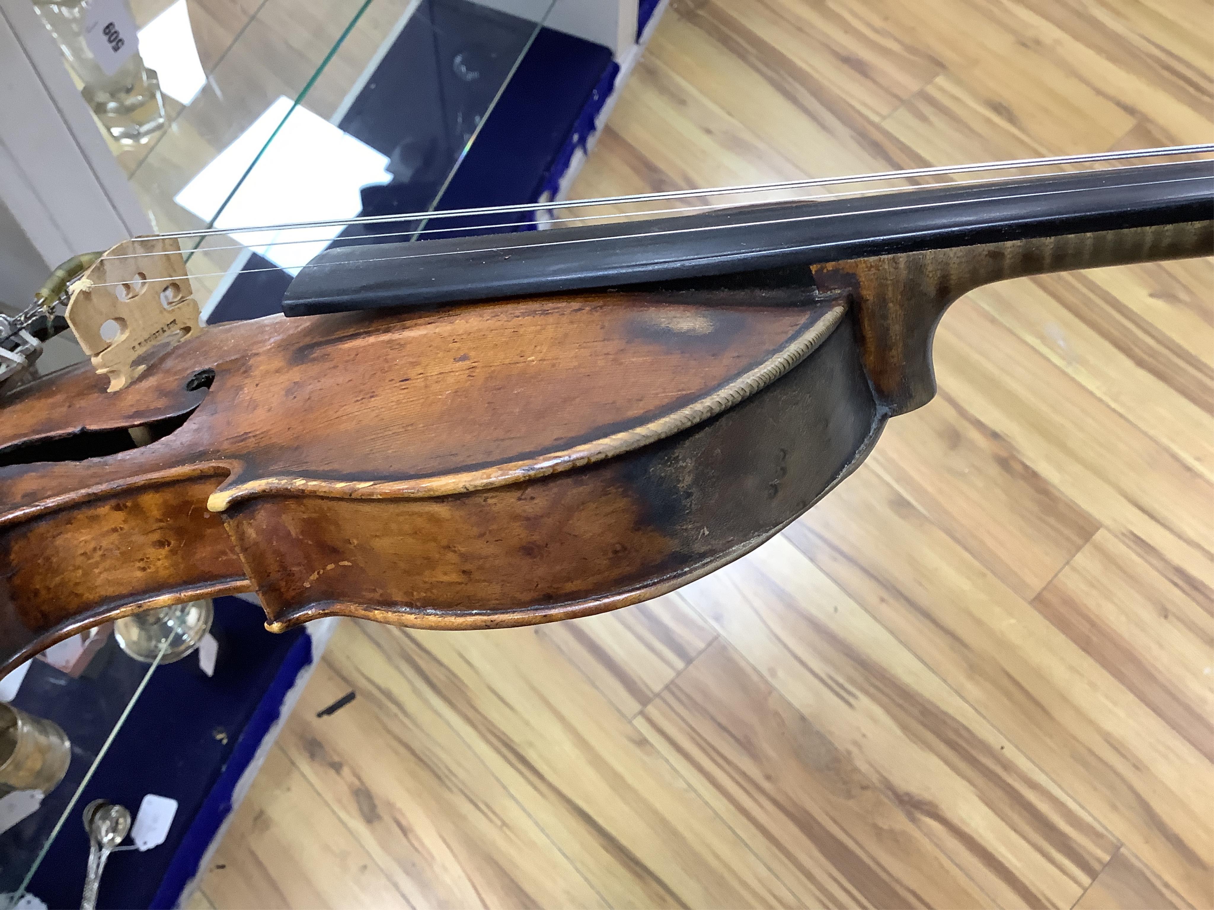An interesting late 18th century violin, with one piece bird’s eye maple back, unsigned, with two silver fully mounted octagonal bows, one stamped Voight CITES Submission reference, 3XFNUBT7 and Submission reference, RHL